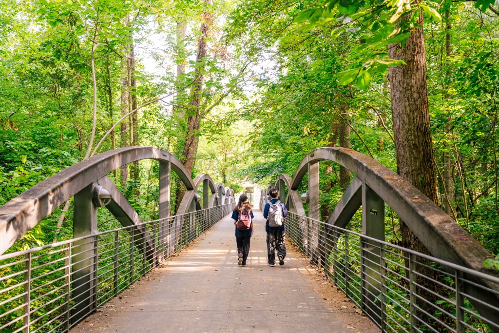 Walking across the bridge to the music building